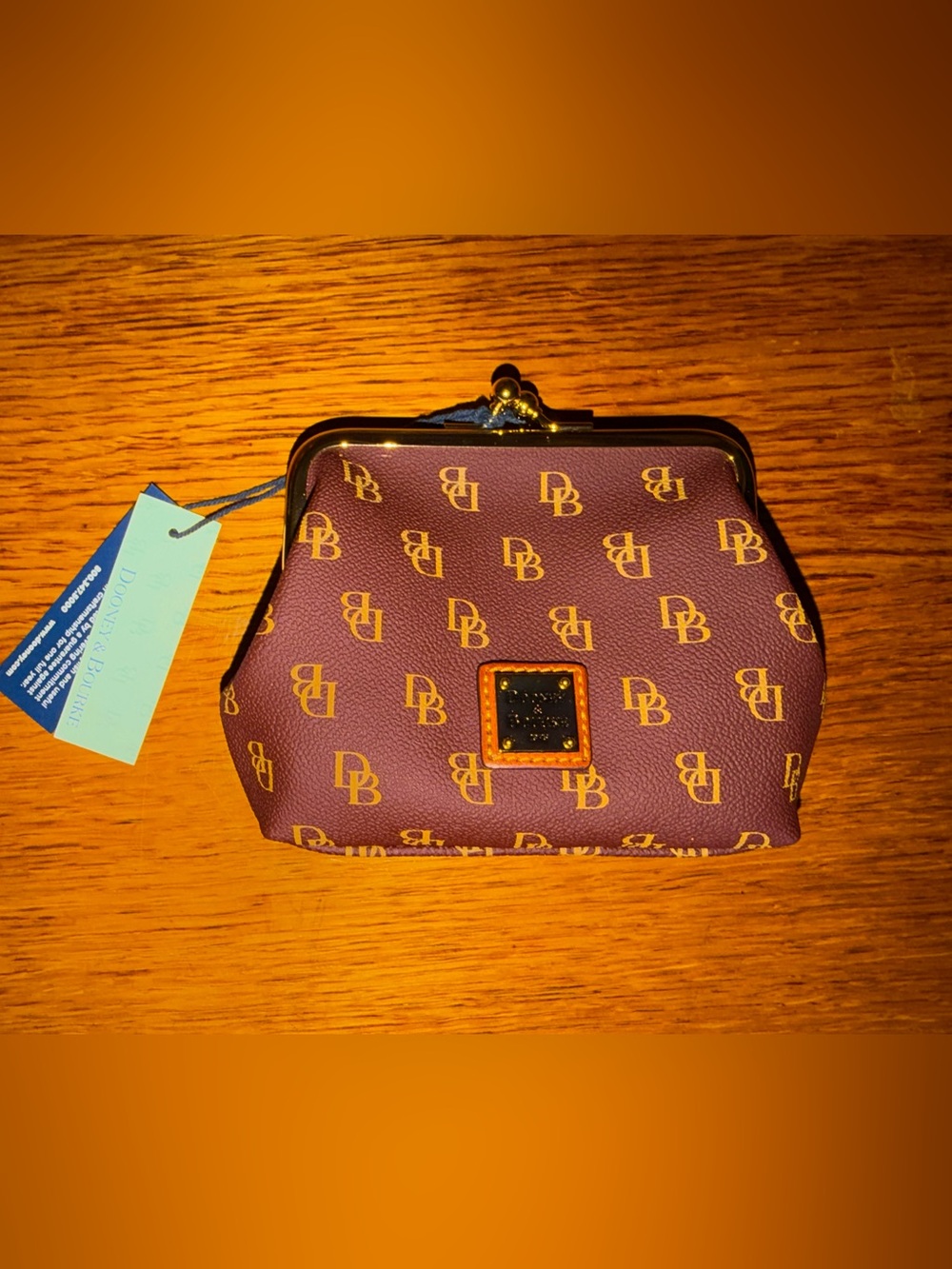 Dooney & Bourke Plum DB Logo Kiss-Lock Cosmetic Pouch with Gold Hardware